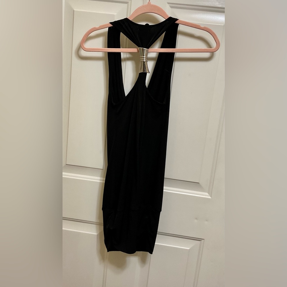 Black halter neck dress with a plunging neckline